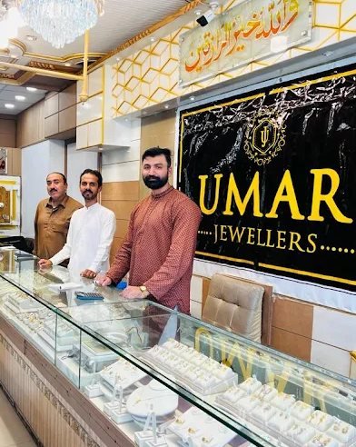 Umar Jeweller, Quaid-e-Azam Road, Block-11, DG Khan
